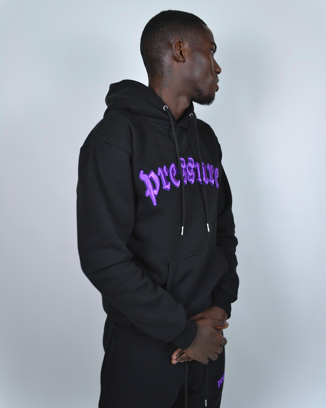 Purple and black sweatsuit sale